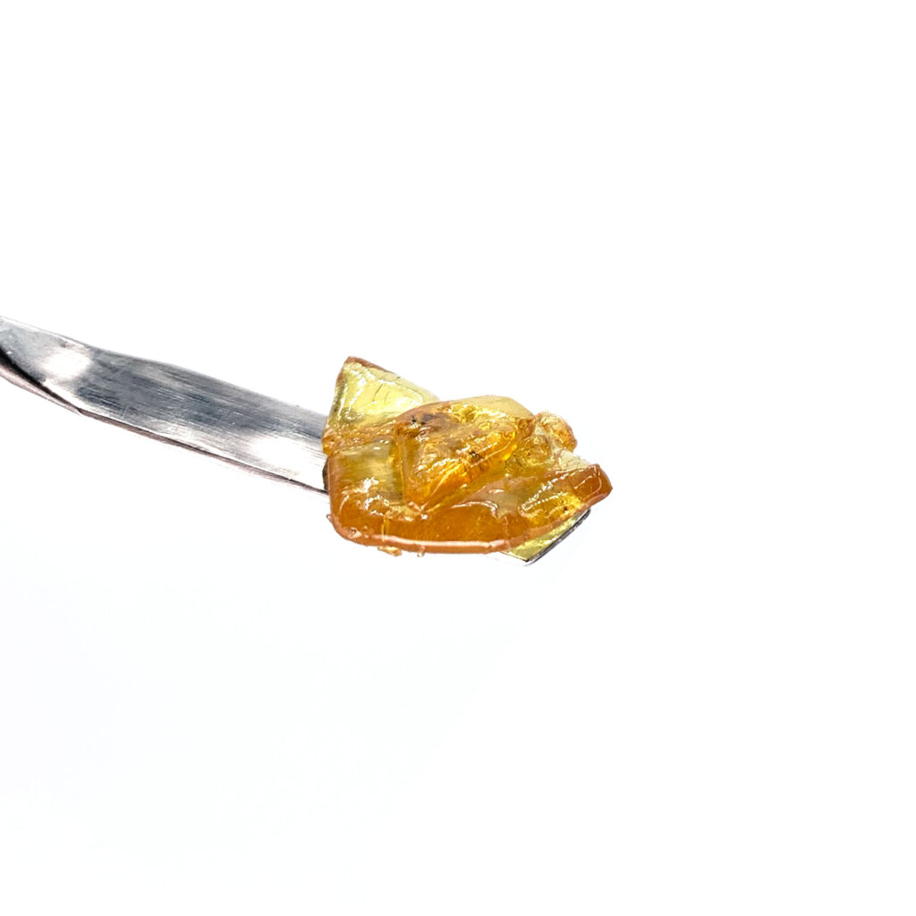 Close up detail on Live Resin Shatter cannabis concentrate.