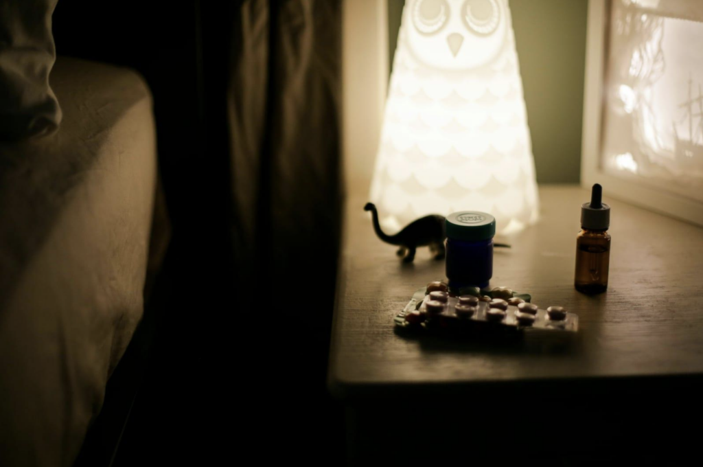 Nighstand with pills.